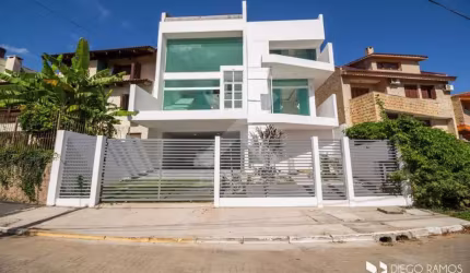 Casa em condomínio fechado com 3 quartos à venda na Rua Alcebíades Antônio dos Santos, 605, Nonoai, Porto Alegre por R$ 1.490.000