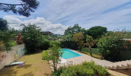 Casa com 3 quartos à venda na Rodovia Haroldo Soares Glavan, 3290, Cacupé, Florianópolis por R$ 2.800.000