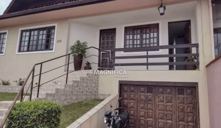 Casa com 3 quartos à venda na Rua Alexandre Dalcuch, 156, Bacacheri, Curitiba, 230 m2 por R$ 980.000
