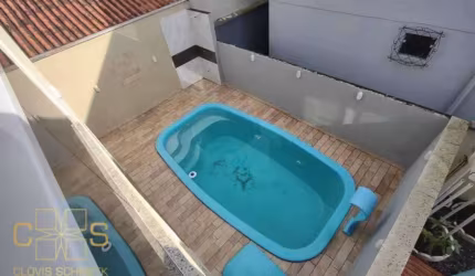 SOBRADO COM PISCINA