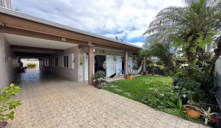 Casa com 5 quartos à venda na Rua Odilon Santana Gomes, 41, Costa Azul, Matinhos, 376 m2 por R$ 1.349.900