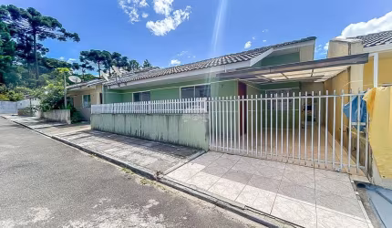 Casa em condomínio fechado com 3 quartos à venda na Rua Presidente Faria, 1120, Colônia Faria, Colombo, 54 m2 por R$ 270.000