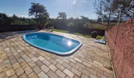 Casa com 5 quartos à venda na Avenida Tiradentes, 640, Mirim, Guaratuba, 200 m2 por R$ 1.600.000