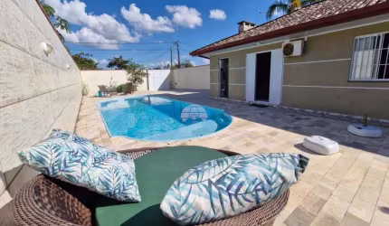 Casa com 4 quartos à venda na Avenida Alvorada Do Sul, 489, Coroados, Guaratuba, 271 m2 por R$ 699.000