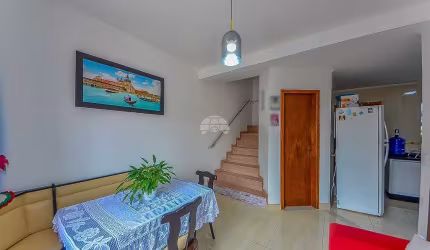 Casa com 3 quartos à venda na Rua Ana Alzira Pereira, 767, Sítio Cercado, Curitiba, 104 m2 por R$ 399.000