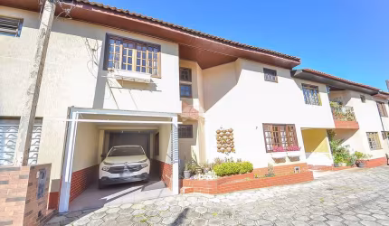Casa em condomínio fechado com 3 quartos à venda na Rua Santo Bozzi, 556, Xaxim, Curitiba, 130 m2 por R$ 540.000