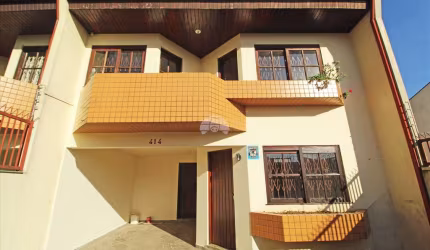 Casa com 3 quartos para alugar na Rua Primo Lourenço Tosin, 414, Novo Mundo, Curitiba, 106 m2 por R$ 3.000