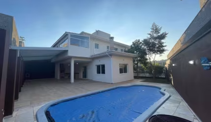 Casa com 4 dormitórios à venda, 341 m² por R$ 2.300.000,00 - Jardim do Golf I - Jandira/SP