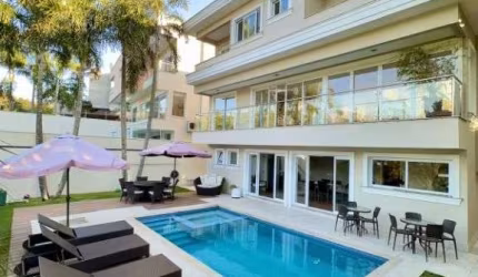Casa com 4 dormitórios, 492 m² - venda por R$ 5.200.000 ou aluguel por R$ 40.000/mês - Alphaville - Santana de Parnaíba/SP