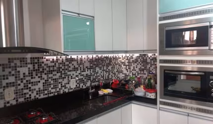 Sobrado com 3 dormitórios à venda, 115 m² por R$ 660.000,00 - Vila São Luiz (Valparaízo) - Barueri/SP
