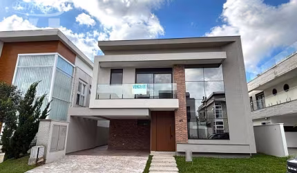 CASA NOVA DE ALTO PADRÃO NO HARMONY VILLAGE CONDOMINIUM, COM 310M², 4 SUÍTES.