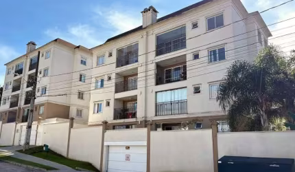 APARTAMENTO 100 % MOBILIADO, ENSOLARADO, VARANDA COM CHURRASQUEIRA. PRÓXIMO A FACULDADE TUIUTI E PARQUE BARIGUI