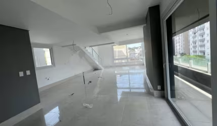 Apartamento duplex de 3 quartos com 3 suítes e 3 vagas à venda no bairro Menino Deus em Porto Alegre