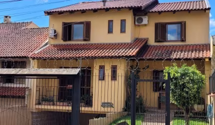 Casa com 3 quartos à venda na Rua Doutor Mário Totta, 2812, Tristeza, Porto Alegre por R$ 870.000