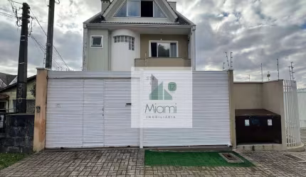 Sobrado com 4 dormitórios à venda, 153 m² por R$ 690.000,00 - Uberaba - Curitiba/PR
