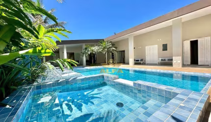 Casa com 6 suítes à venda, Mobiliada e decorada, Condomínio Jardim Acapulco Guarujá.