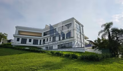 LINDA CASA COM VISTA PANORÂMICA PARA TODO O CONDOMÍNIO FECHADO!
