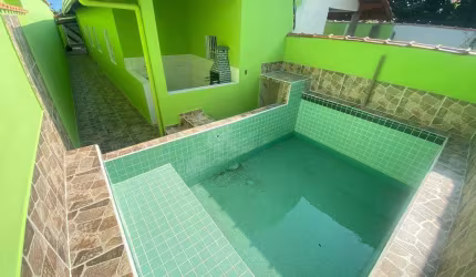 Casa à venda em Mongaguá, Jardim Primavera, com 1 suíte, com 75 m²
