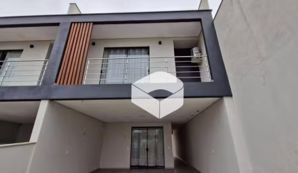 Sobrado com 3 dormitórios à venda, 145 m² por R$ 860.000,00 - Centro - Balneário Piçarras/SC