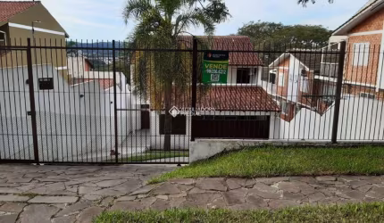 Casa com 3 quartos à venda na Rua Lloyd de Andrade Polidoro, 106, Ipanema, Porto Alegre, 204 m2 por R$ 780.000