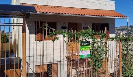 Casa com 4 quartos à venda na Rua Martim Minaberry, 405, Partenon, Porto Alegre, 140 m2 por R$ 400.000