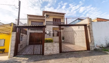 Casa com 3 quartos à venda na Travessa Costa Luiz, 26, Vila São José, Porto Alegre, 250 m2 por R$ 580.000