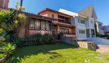 Casa em condomínio fechado com 3 quartos à venda na Rua Tocantins, 869, Lomba do Pinheiro, Porto Alegre, 336 m2 por R$ 2.000.000