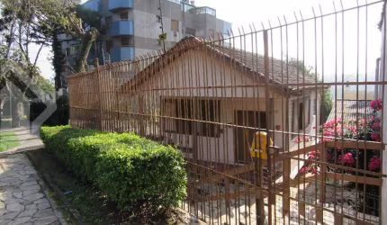 Casa em condomínio fechado com 3 quartos à venda na Rua Doutor Rodrigues Alves, 263, Chácara das Pedras, Porto Alegre, 363 m2 por R$ 550.000
