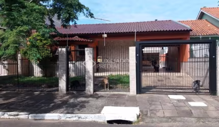 Casa em condomínio fechado com 3 quartos à venda na Rua Dinarte de Albuquerque, 35, Parque Santa Fé, Porto Alegre, 178 m2 por R$ 570.000