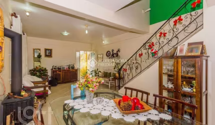 Casa com 5 quartos à venda na Rua Doutor Luiz da Silva Flores, 86, Teresópolis, Porto Alegre, 308 m2 por R$ 1.100.000