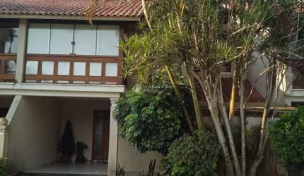 Casa em condomínio fechado com 4 quartos à venda na Avenida Eduardo Prado, 2050, Cavalhada, Porto Alegre, 300 m2 por R$ 1.300.000