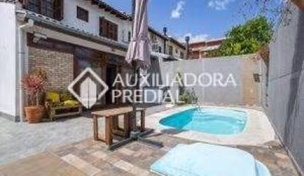 Casa com 3 quartos à venda na Rua Criciúma, 345, Guarujá, Porto Alegre, 147 m2 por R$ 570.000