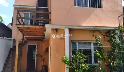 Casa com 4 quartos à venda na Rua Aldrovando Leão, 85, Vila Jardim, Porto Alegre, 264 m2 por R$ 890.000