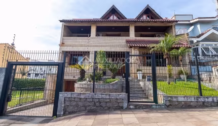 Casa com 5 quartos à venda na Rua Dona Adda Mascarenhas de Moraes, 1492, Jardim Itu Sabará, Porto Alegre, 605 m2 por R$ 3.500.000