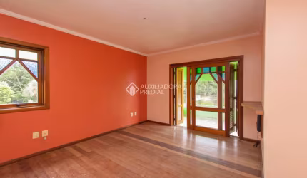 Casa com 3 quartos à venda na Rua Augusto Lourenço Martins, 110, Vila Nova, Porto Alegre, 185 m2 por R$ 560.000