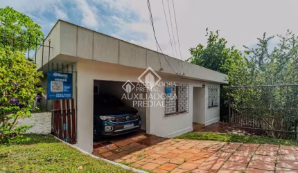 Casa com 3 quartos à venda na Rua Diamantina de Bittencourt Oliveira, 10, Nonoai, Porto Alegre, 146 m2 por R$ 350.000
