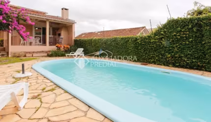 Casa com 3 quartos à venda na Rua César de Castro, 163, Teresópolis, Porto Alegre, 249 m2 por R$ 780.000