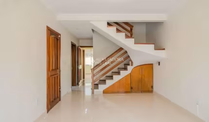Casa em condomínio fechado com 3 quartos à venda na Avenida Orleaes, 105, Guarujá, Porto Alegre, 207 m2 por R$ 650.000