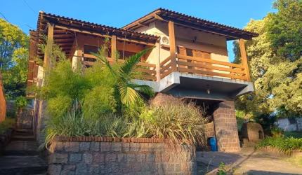 Casa com 3 quartos à venda na Avenida Vicente Monteggia, 2486, Cavalhada, Porto Alegre, 1534 m2 por R$ 2.000.000