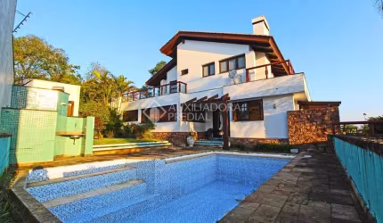 Casa com 3 quartos à venda na Rua Dona Lida Monteiro, 180, Teresópolis, Porto Alegre, 600 m2 por R$ 1.890.000