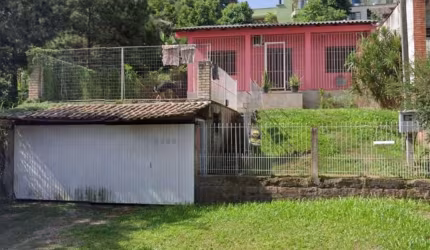 Casa em condomínio fechado com 2 quartos à venda na Avenida Vicente Monteggia, 1836, Cavalhada, Porto Alegre, 106 m2 por R$ 650.000