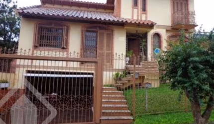 Casa com 4 quartos à venda na Rua Congo, 321, Vila Ipiranga, Porto Alegre, 285 m2 por R$ 995.000