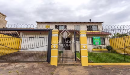 Casa com 4 quartos à venda na Rua das Petúnias, 277, Estância Velha, Canoas, 182 m2 por R$ 990.000