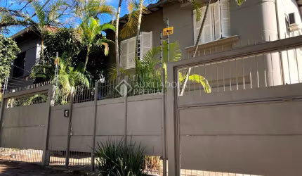 Casa em condomínio fechado com 4 quartos à venda na Rua Eudoro Berlink, 222, Auxiliadora, Porto Alegre, 240 m2 por R$ 2.350.000