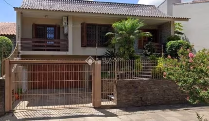 Casa com 4 quartos à venda na Rua Maestro Salvador Campanella, 70, Jardim Itu Sabará, Porto Alegre, 313 m2 por R$ 1.300.000