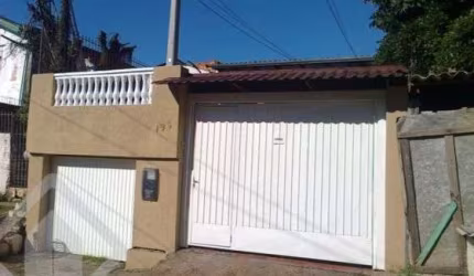 Casa em condomínio fechado com 3 quartos à venda na Rua Cananéia, 198, Vila Jardim, Porto Alegre, 343 m2 por R$ 250.000