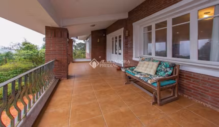 Casa com 4 quartos à venda na Rua Deputado Astério de Mello, 415, Teresópolis, Porto Alegre, 359 m2 por R$ 1.720.000
