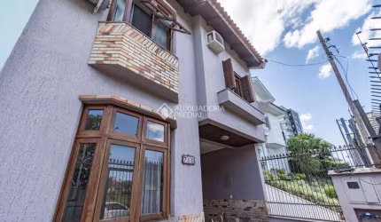 Casa com 3 quartos à venda na Rua Walir Zottis, 707, Jardim Itu Sabará, Porto Alegre, 157 m2 por R$ 720.000