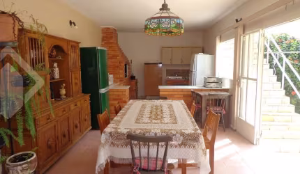 Casa em condomínio fechado com 3 quartos à venda na Rua Aluízio de Azevedo, 35, Jardim Itu Sabará, Porto Alegre, 197 m2 por R$ 1.200.000