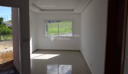 Casa em condomínio fechado com 3 quartos à venda na Rua Madre Celina Maria Azambuja, 164, Mário Quintana, Porto Alegre, 111 m2 por R$ 540.000